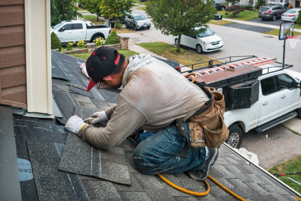 Professional Roofing technician working in Mainland, PA
